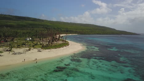 Drone-shot-along-the-coastline-of-Tinian,-an-island-in-the-Philippine-Sea