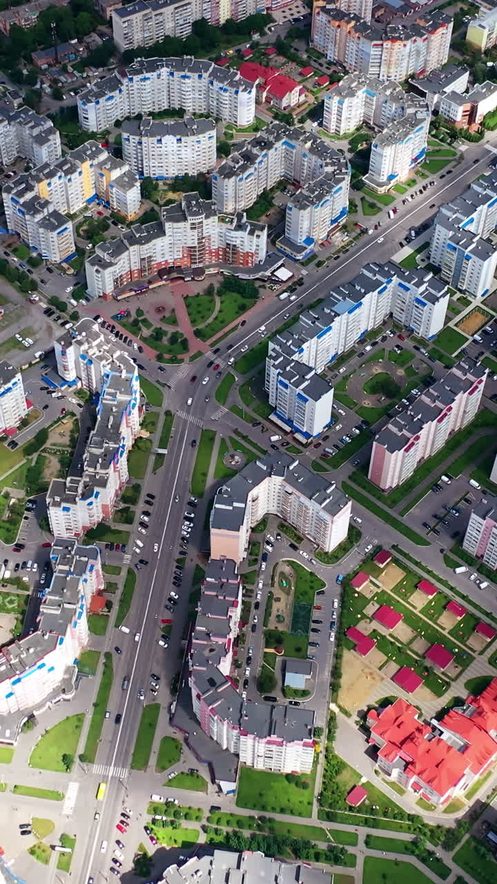 Buildings blocks from the high. Aerial top down view of new estate with neighborhood faculties