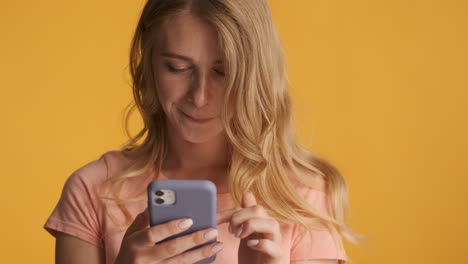 Caucasian-woman-scrolling-on-smartphone.