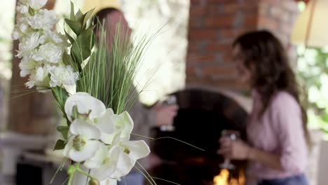 couple enjoying a bbq dinner outdoors