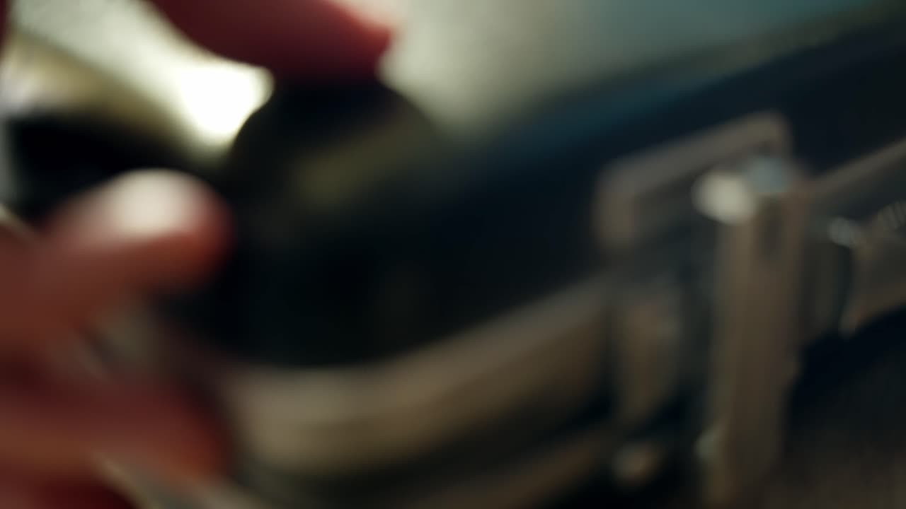 Close up on top secret envelopes with classified files closed inside briefcase. Confidential material being put inside suitcase. Spy or government agent stealing secret information for trade and sale