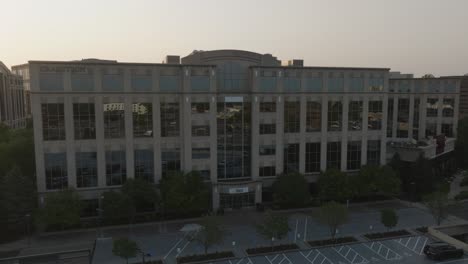 aerial view of a modern office building at sunset