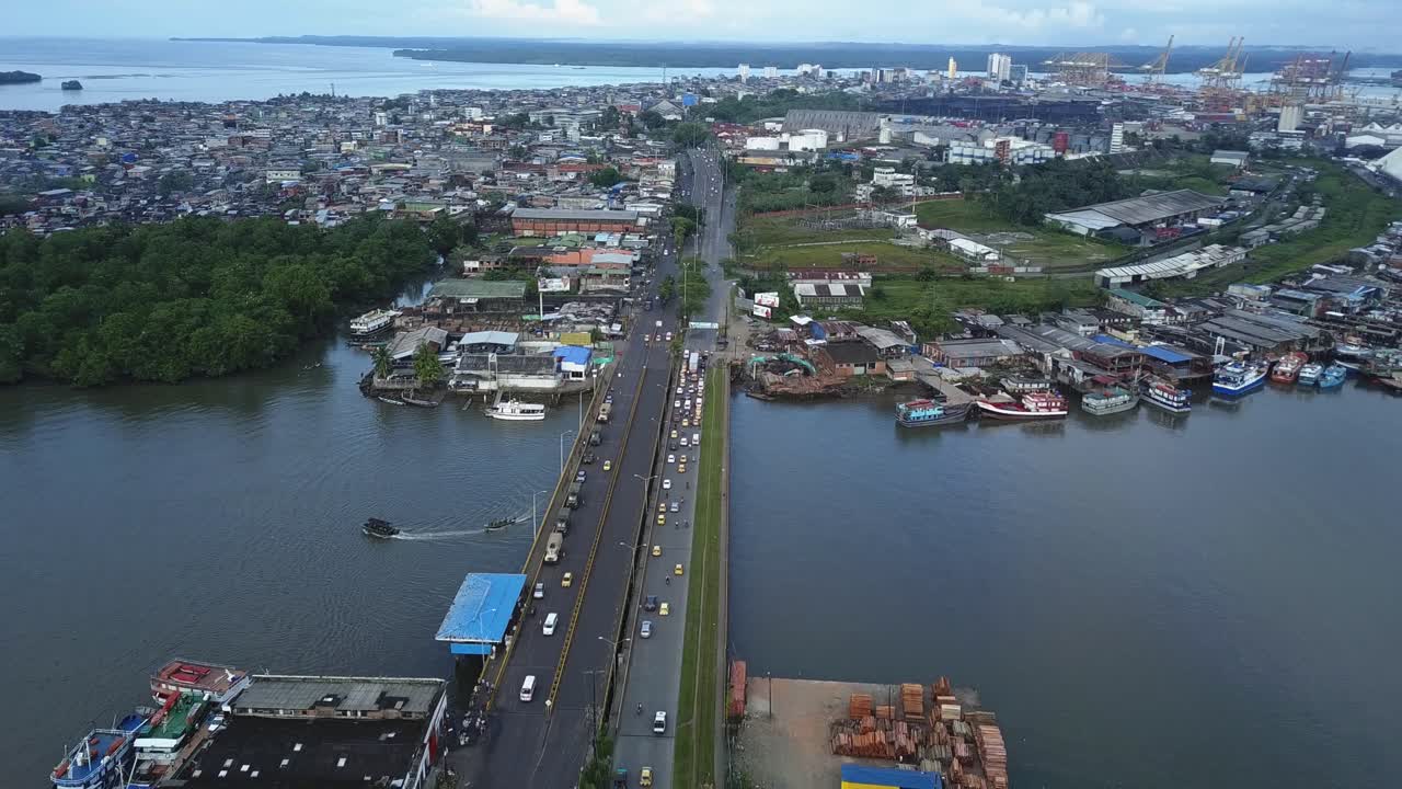 Aerial shot showing a military convoy on a bridge in Buenaventura Colombia