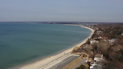 a high angle aerial view over meschutt beach on peconic river, long island, ny