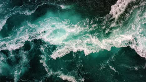 waves of water of the river and the sea meet each other during high tide and low tide.