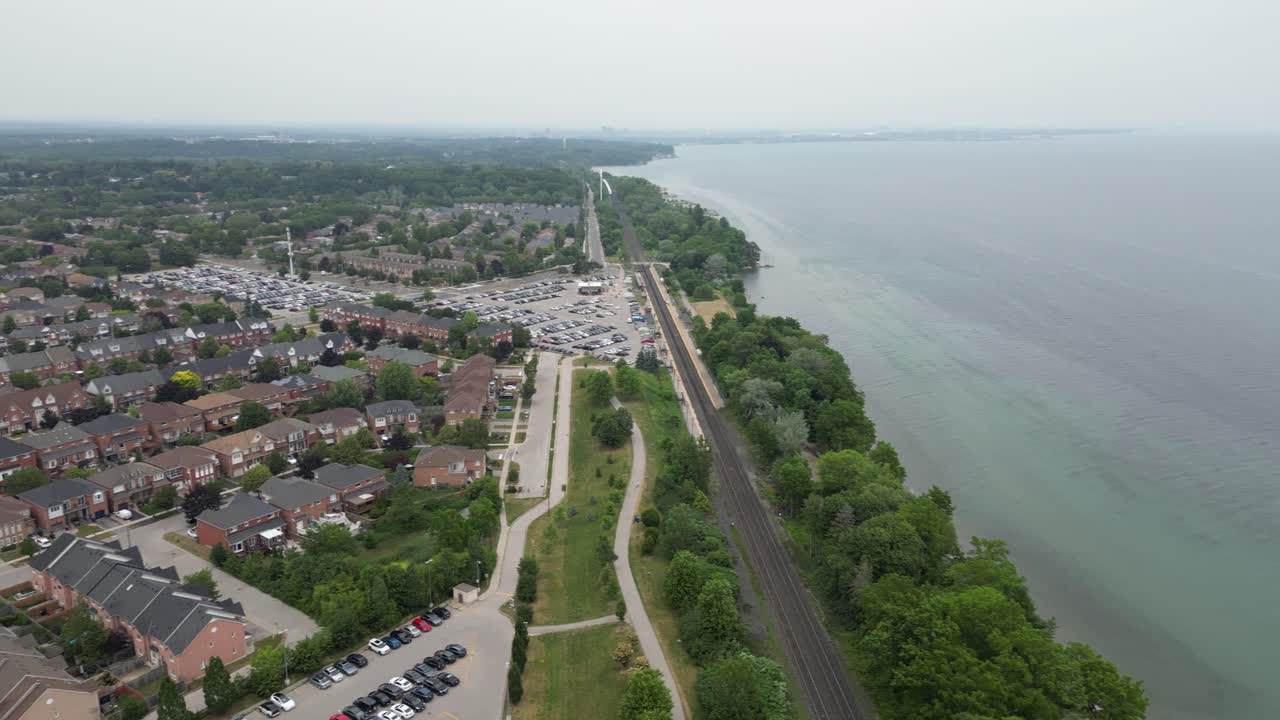 VIA Rail train traveling along Rouge shoreline seen from above