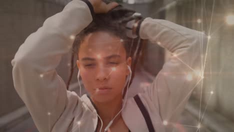 animación de redes de conexiones sobre mujeres atando rastas y haciendo ejercicio en la ciudad