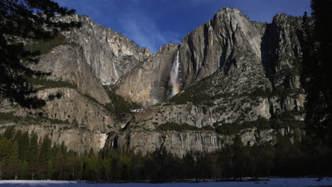 yosemite waterfall on a beautiful snowy winters day