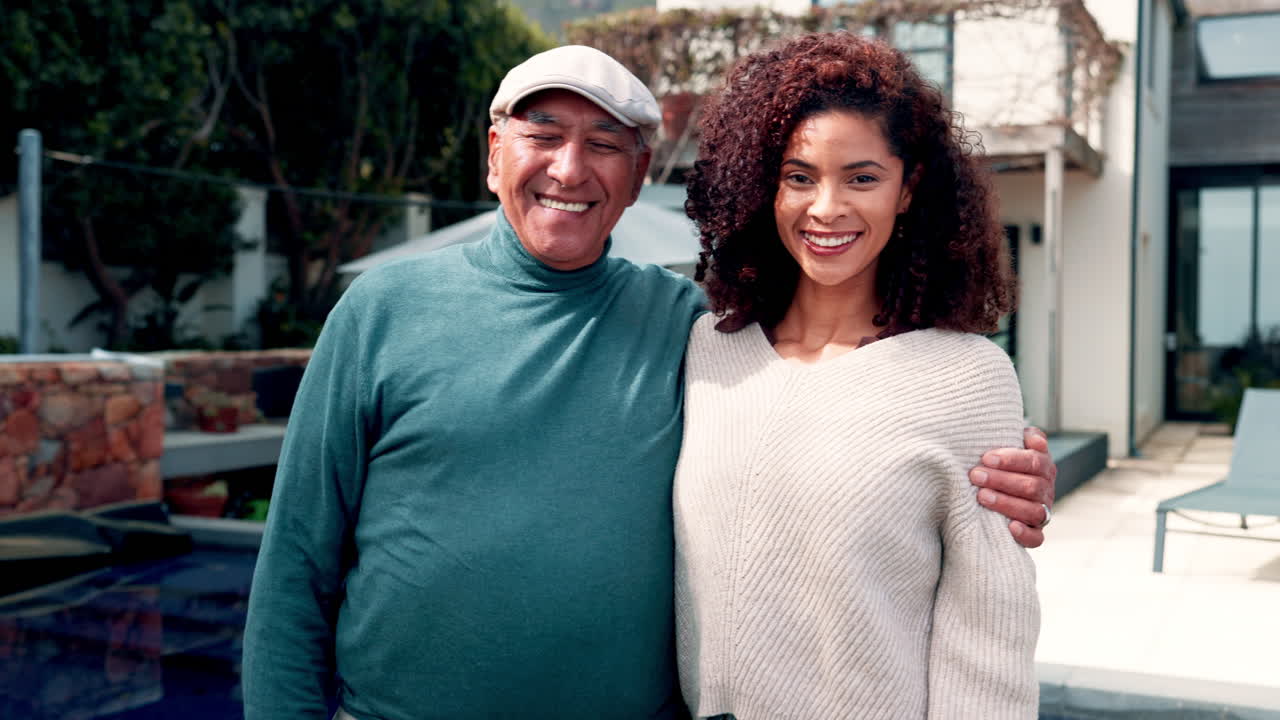 Happy Father and Daughter Smiling Together in Backyard