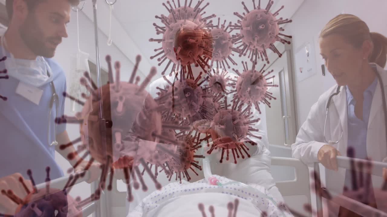 Animazione di cellule COVID-19 sopra medici in ospedale.