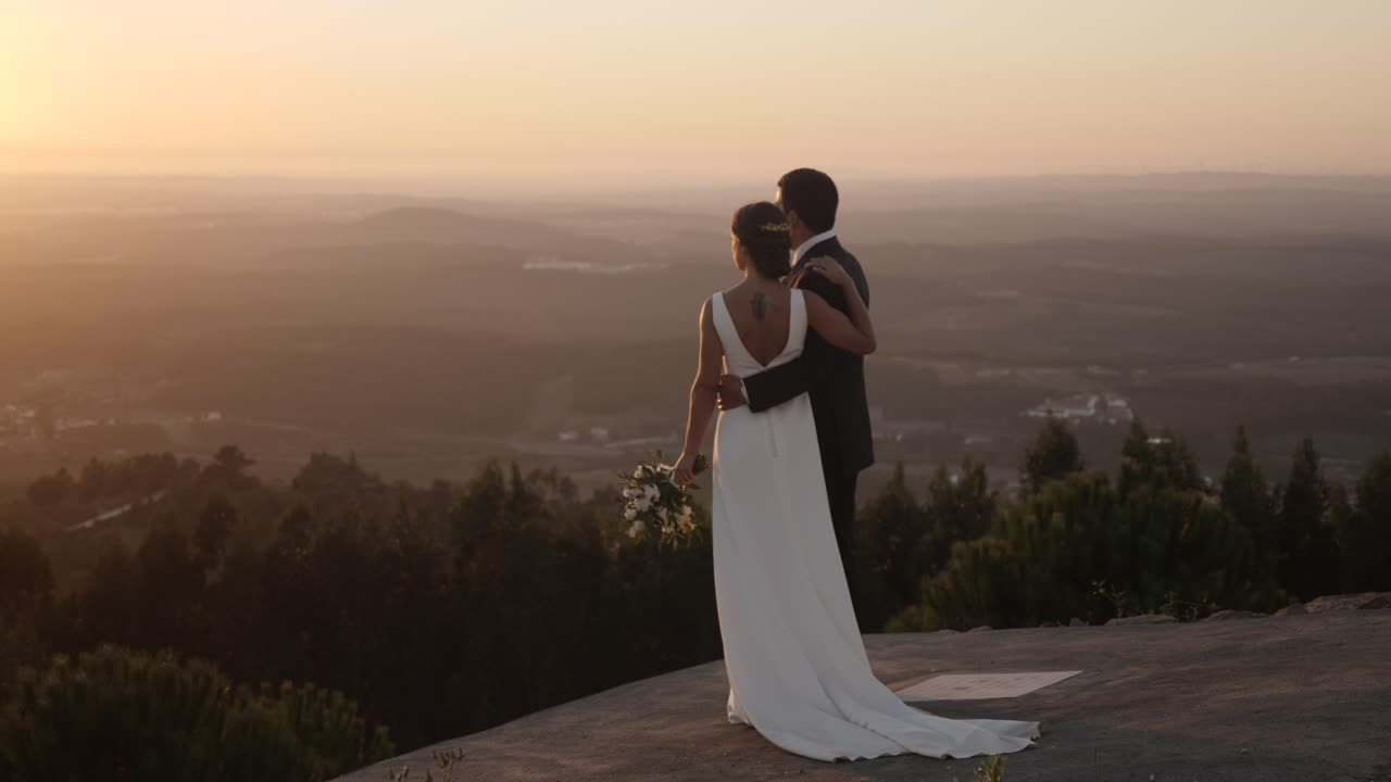 Fresh married couple in the sunset
