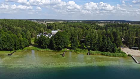 Shoreline-of-typical-kashubian-lake-of-Jezioro-Gwiazdy-in-Borowy-Młyn-in-Kashubia,-Pomeranian-Voivodeship,-Poland