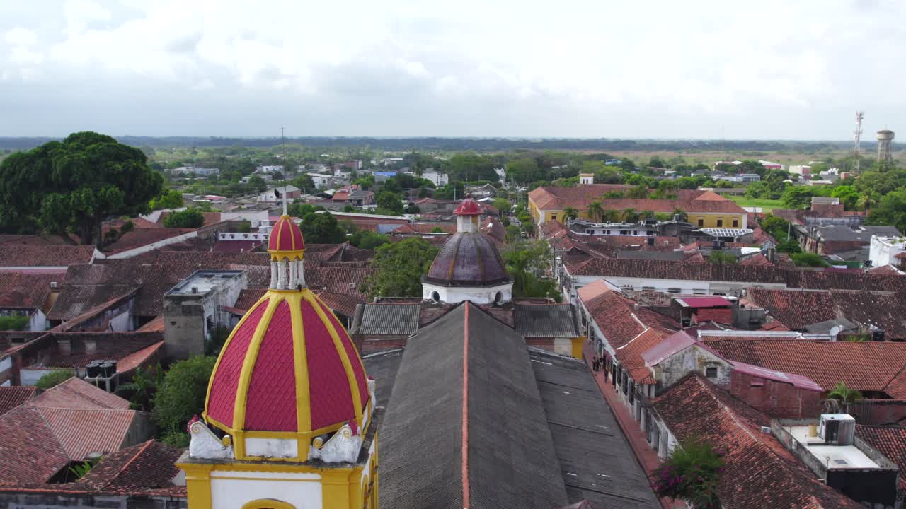 Church of the Immaculate Conception. Its elegant white façade, adorned with colonial details and towering arches, reflects the devotion and artistry of a bygone era. Cinematic Throttle up.