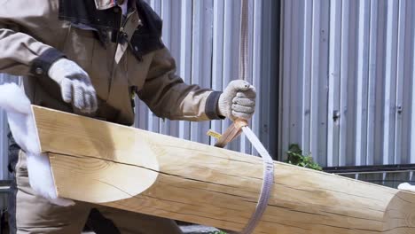 log beam handling during construction