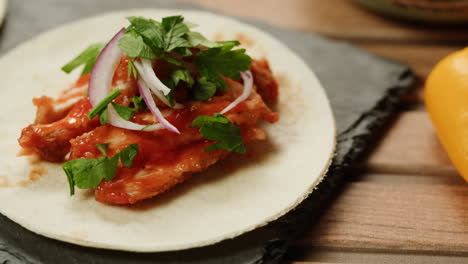 chicken taco on slate plate