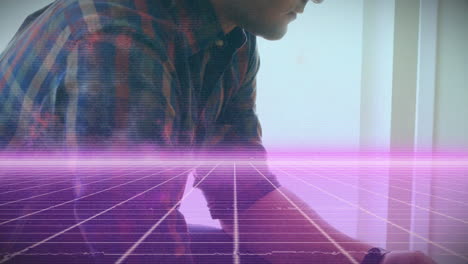person in plaid shirt interacting with digital grid and purple light animation