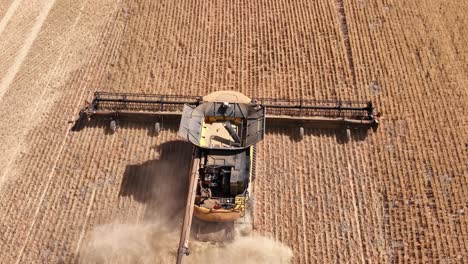 This-footage-captures-the-synergy-of-modern-agricultural-technology,-showcasing-the-essential-role-of-header-fronts-in-the-wheat-harvesting-process