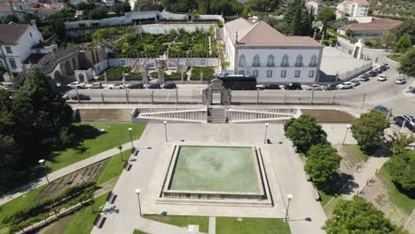 aerial backward over municipal garden of castelo branco in portugal