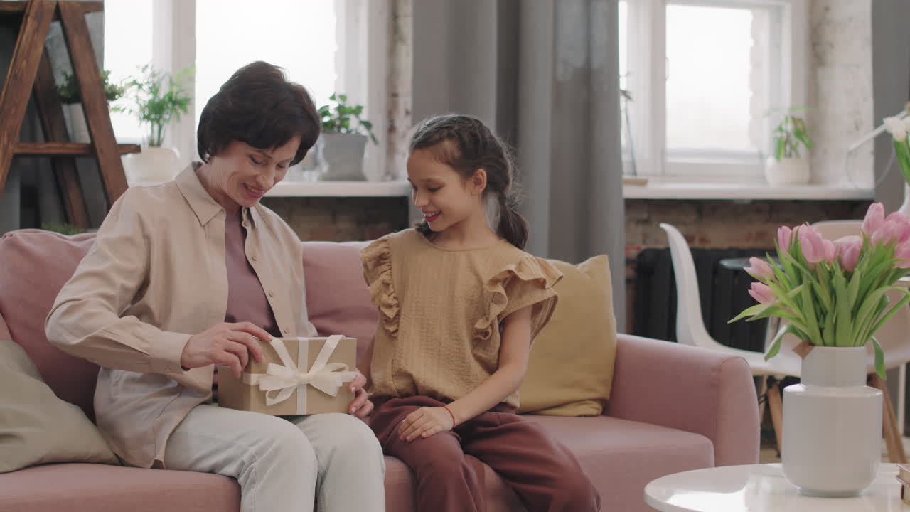 Grandmother and Granddaughter with a Gift