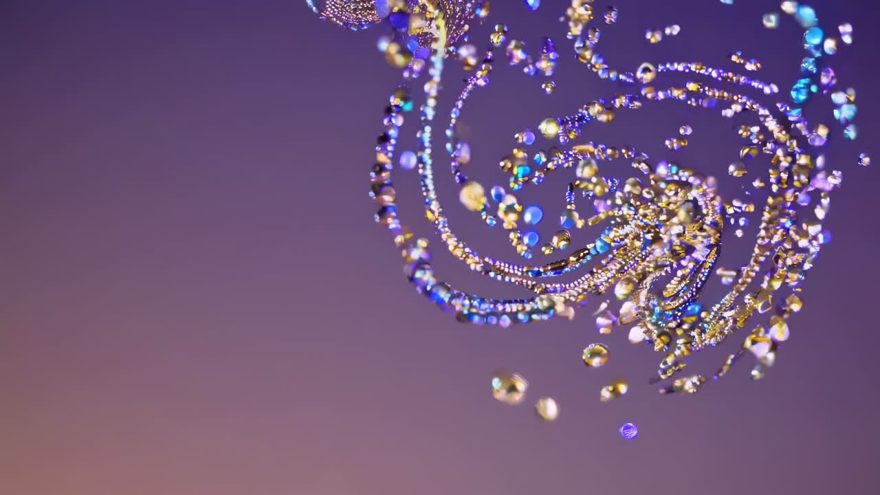 A mesmerizing video of shimmering particles swirling upward against a purple sky