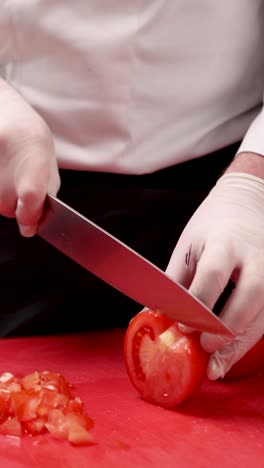 chef chopping tomatoes