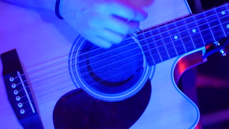 guitar acoustic player close-up