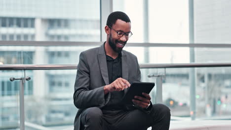 company tablet, black man sitting