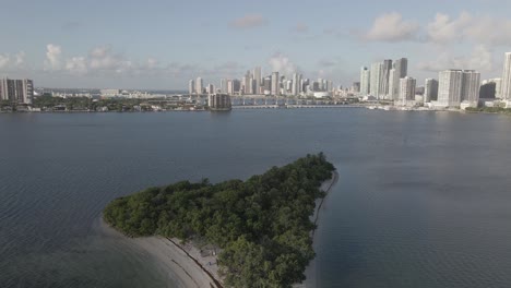 aerial flyover pace picnic island view toward downtown miami, fla