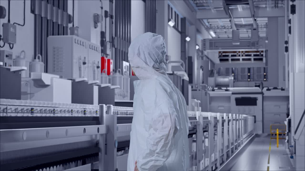 Side View Of Asian Male Scientist Putting Hands On His Hip And Looking Around At Pharmaceutical Factory, Vaccine Production Facility