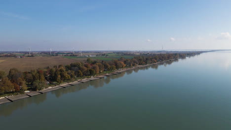 panoramic aerial overview of blenheim lake erie coastal township with wind turbines and fields