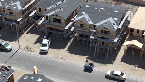 New-housing-development-under-construction-in-Los-Angeles-Neighborhood,-aerial-dolly-topdown-shot