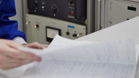 scientist reviewing notes in a laboratory