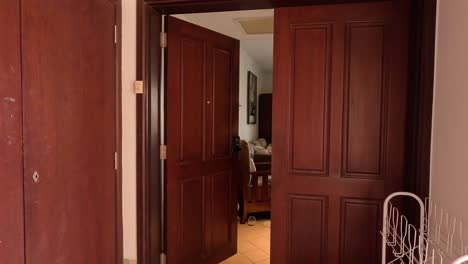 wooden door repeatedly opening and closing