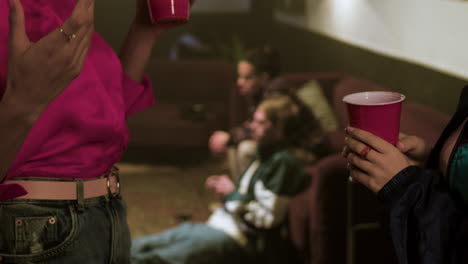 women talking and drinking