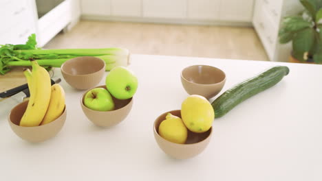 fresh fruits and vegetables on kitchen counter, ready for healthy meal prep
