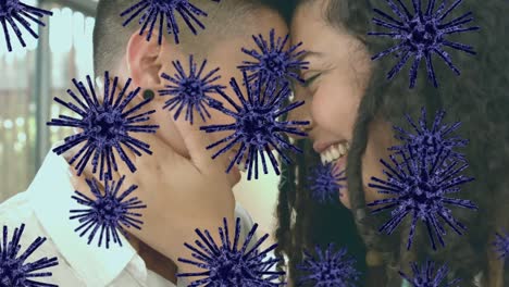 animación de células de virus sobre una feliz pareja de lesbianas diversas abrazándose