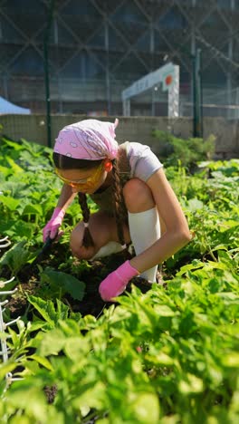 girl gardening in an urban community garden