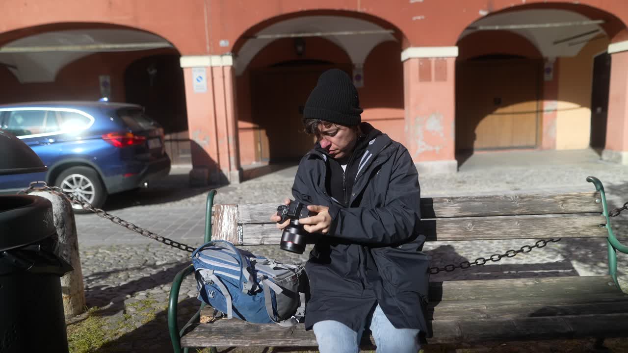 Photographer taking pictures in a European city