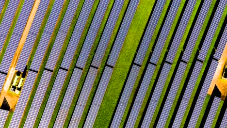 descending rotating aerial view of a large solar farm, cambridgeshire, uk