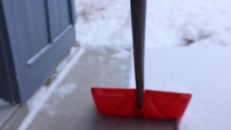 snow shoveling fresh powder snow from recent storm