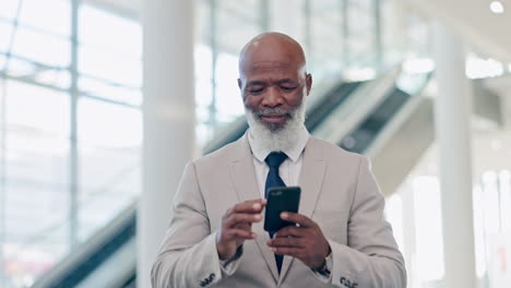 Phone,-ceo-and-mature-black-man-typing-in-office