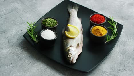 spices lying on plate near fish