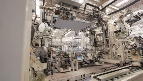 industrial robots in a manufacturing plant