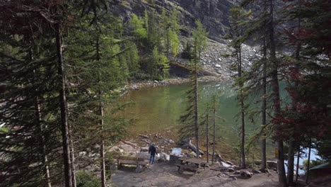 lake agnes tourists looking at sign high angle alberta canada pan