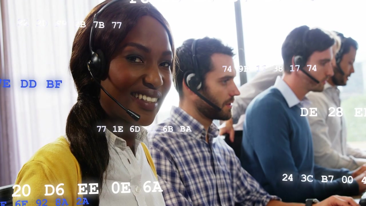 Call-center woman typing, fixing headset and smiling during calls, code overlay drifting over team