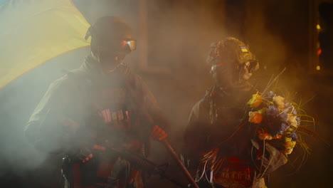 soldiers in ukraine with flowers and weapons