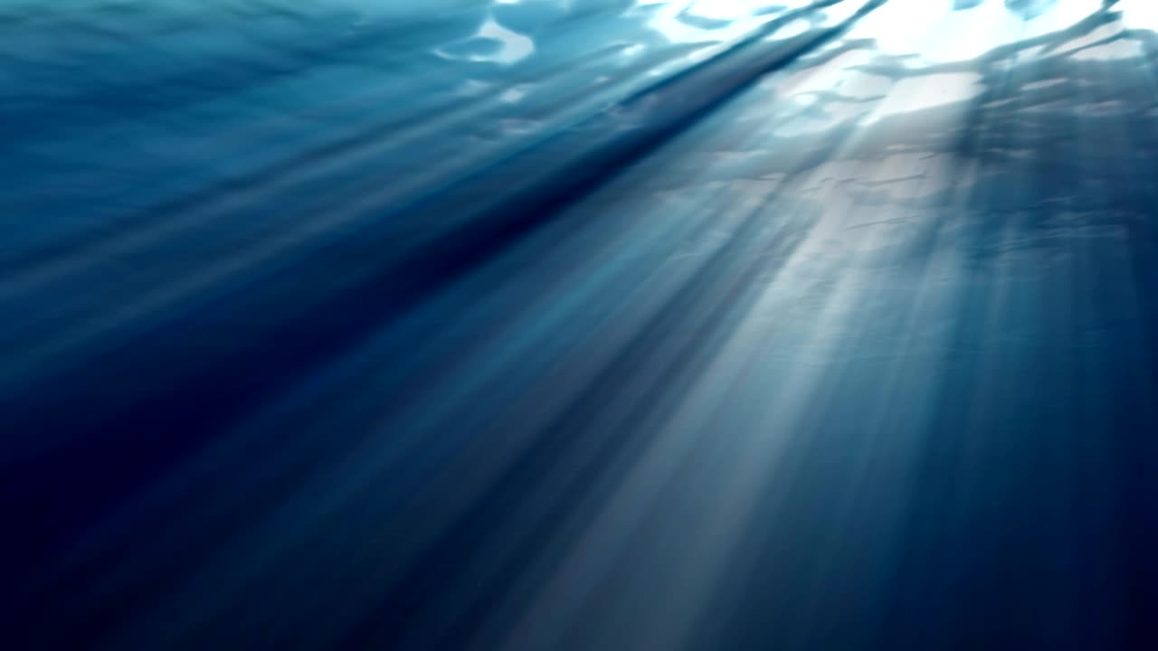 animación en bucle de alta calidad de las olas del océano de bajo el agua realista. rayos de luz brillando a través