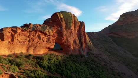 hole in mountain track right to left drone shot in slow motion