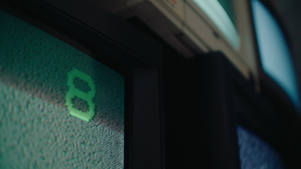 number 8 displayed in a cornet of old retro vintage crt tv television monitor in multi media laboratory room