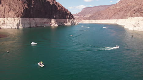 aerial follow of boat on lake mead powell